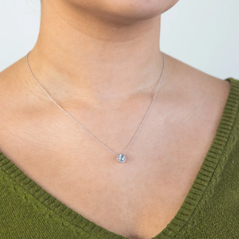 9ct White Gold 0.45ct Aquamarine and Diamond Halo Pendant on 45cm Chain Shiels