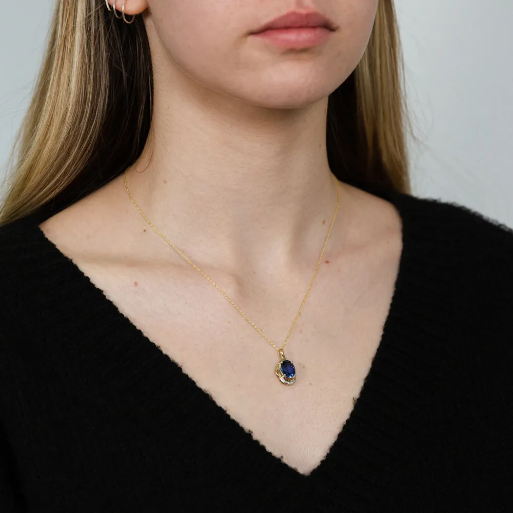 9ct Yellow Gold Created Ceylon Sapphire and Diamond Pendant on 45cm Chain Shiels