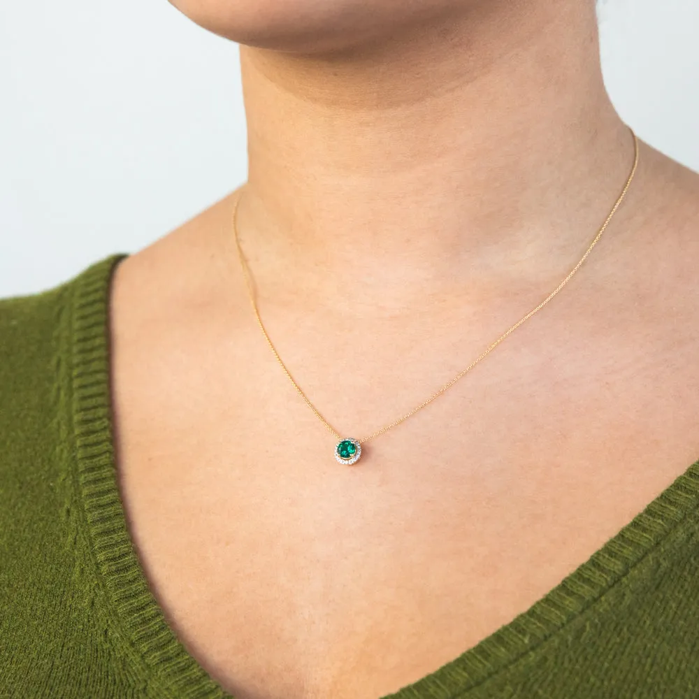 9ct Yellow Gold Created Emerald and Diamond Halo Pendant on 45cm Chain Shiels