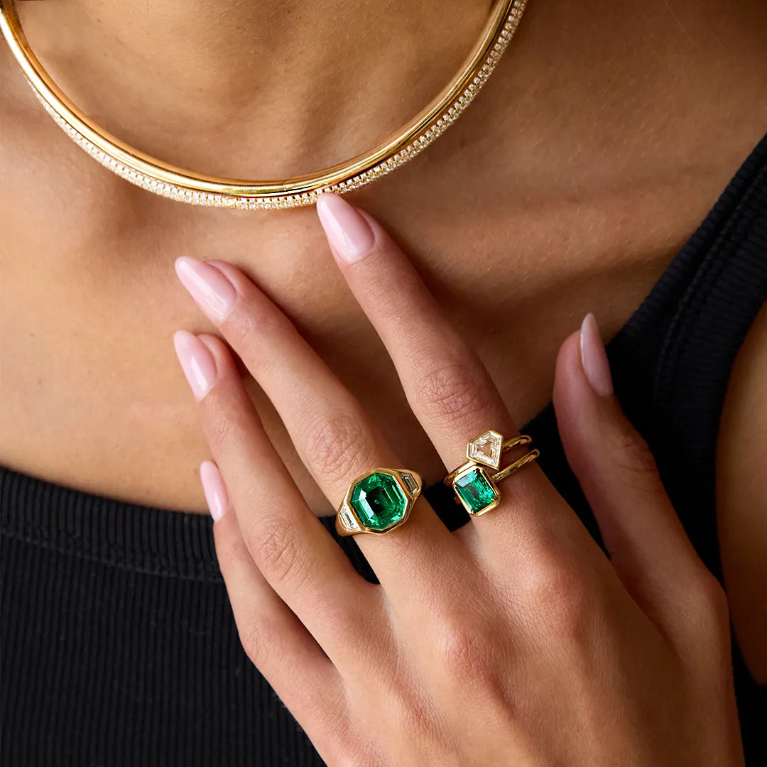 OCTAGONAL EMERALD AND TRAPEZOID DIAMOND BEZEL RING Anita Ko